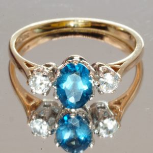9ct Gold Blue Topaz Trilogy Ring Hallmark UK Size 0 Pre Owned